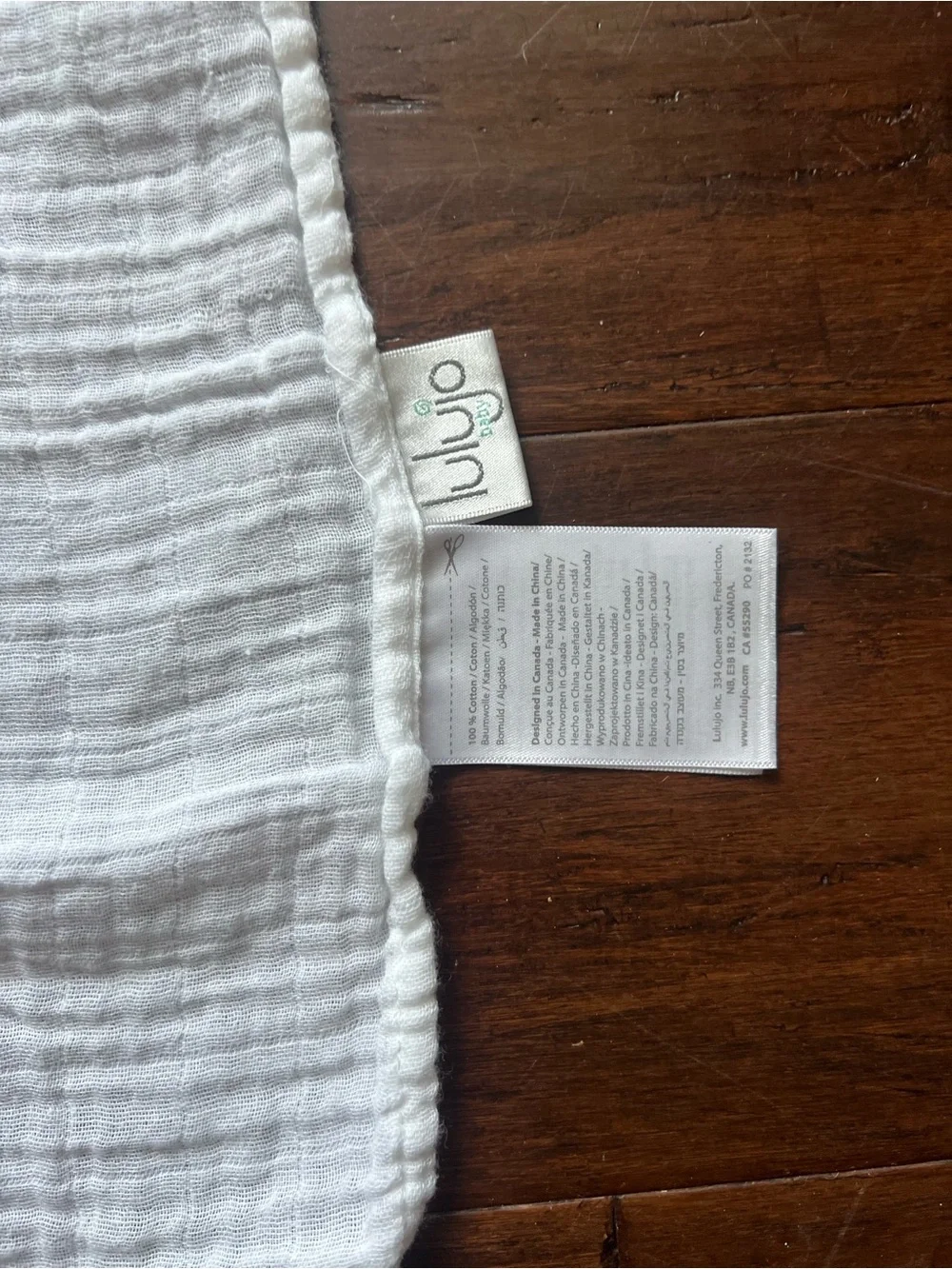 White Muslin Throw Blanket with Pink Floral Wreath for baby pictures